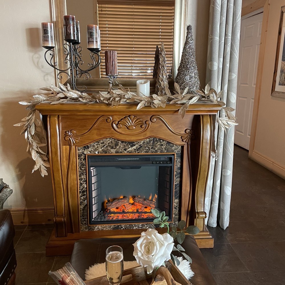 Altitudes Massage & Spa - Seating area with fireplace decorated beautifully - Massage Near Me - Big Bear Lake, California Altitudes Massage & Spa - Seating area with fireplace decorated beautifully - Massage Near Me - Big Bear Lake, California