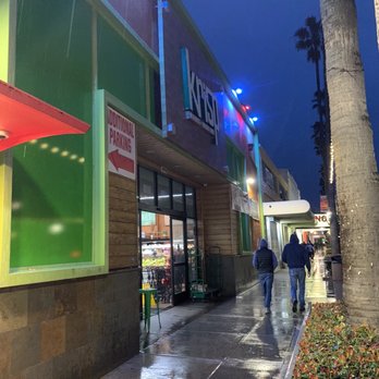 Krisp Beverages + Natural Foods - storefront at night - Grocery Near Me - San Diego, California