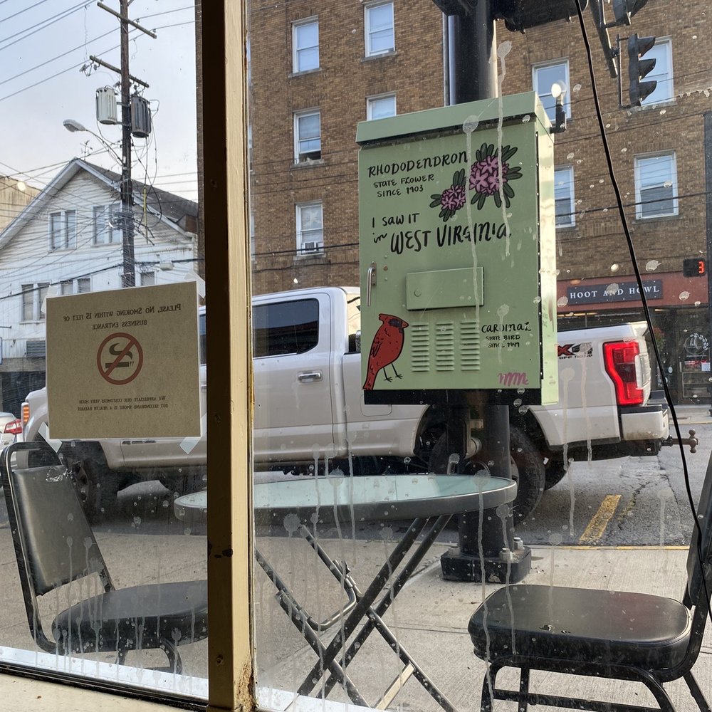Looking out front window around 7:30 AM They just put the tables and chairs out.