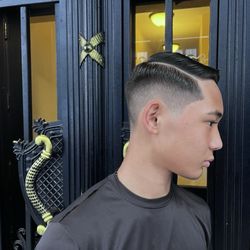 Premier Barbershop Hawaii - Fade and hard line by Jon