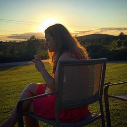 Enjoying the sunset while having a cone.