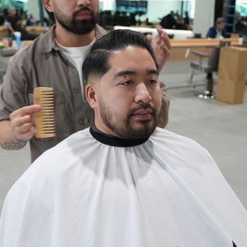 Paradox - Martin (Owner) - giving a long time client a classic combover hairstyle + beard service - Barbers Near Me - Fremont, California Paradox - Martin (Owner) - giving a long time client a classic combover hairstyle + beard service - Barbers Near Me - Fremont, California