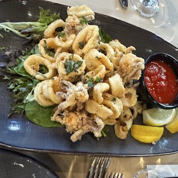 Cafe Bella Mia - Fried calamari with signature marinara sauce - Pizza Near Me - Bay Shore, New York Cafe Bella Mia - Fried calamari with signature marinara sauce - Pizza Near Me - Bay Shore, New York