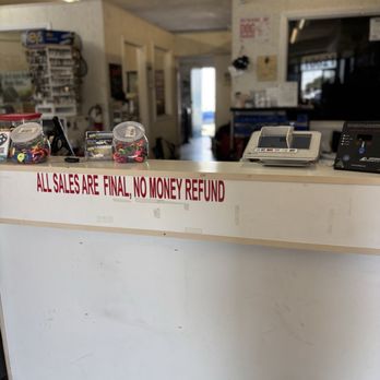 Willy’s Locksmith - Inside - no refunds sign - Roadside Assistance Near Me - Stanton, California