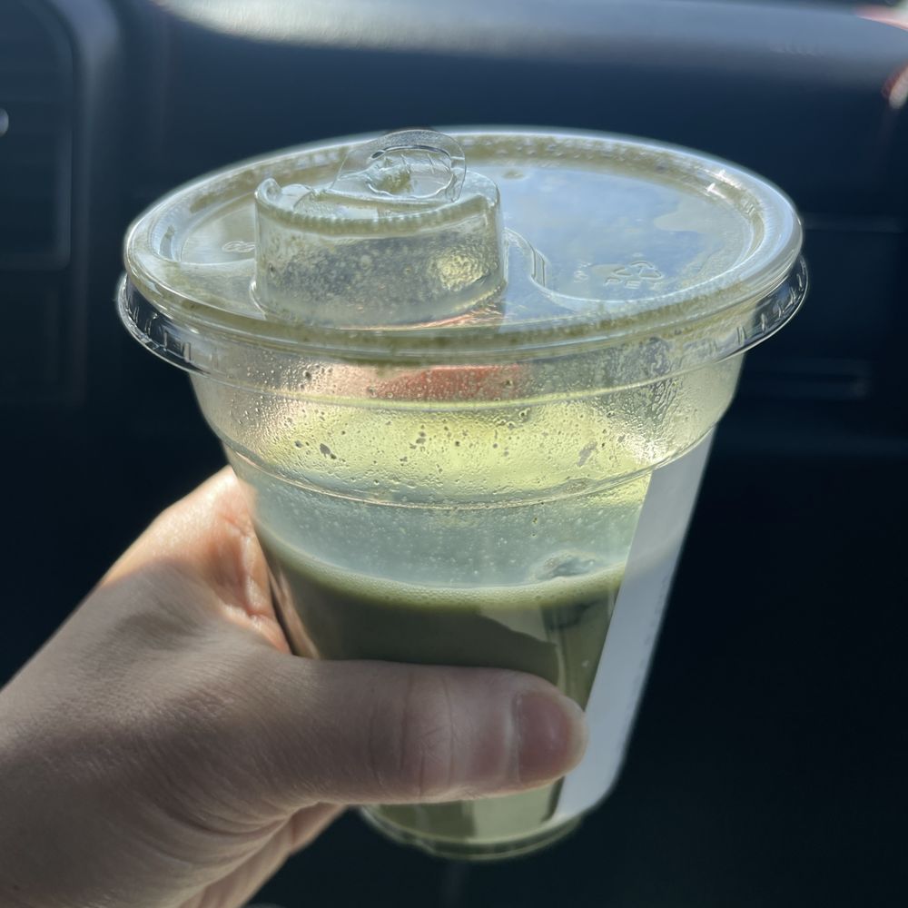 Black Rifle Coffee - Plastic cup with warm matcha - Coffee & Tea Near Me - Houston, Texas