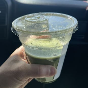 Black Rifle Coffee - Plastic cup with warm matcha - Coffee & Tea Near Me - Houston, Texas Black Rifle Coffee - Plastic cup with warm matcha - Coffee & Tea Near Me - Houston, Texas
