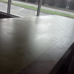 McDonald's - Every table dirty and sticky, and that's an area you can see. Imagine the kitchen:-(