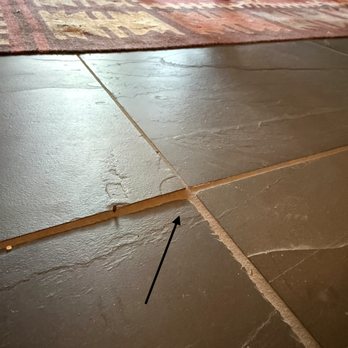 AE Tile - one of many poorly set tiles - Flooring Near Me AE Tile - one of many poorly set tiles - Flooring Near Me
