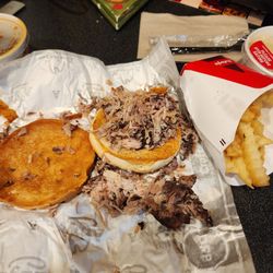 Arby's - Quarter Pound Pulled Pork Sandwich Look how small the bun and sandwich are. Definitely not a quarter pound of meat.