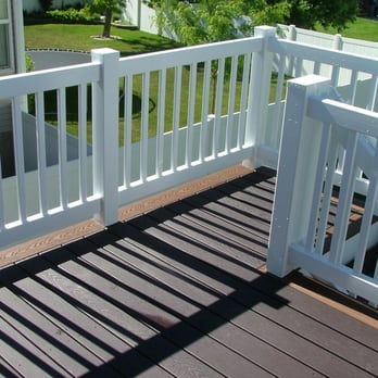 Broderick Builders - a deck with railings and stairs - General Contractors Near Me - Centerville, Utah Broderick Builders - a deck with railings and stairs - General Contractors Near Me - Centerville, Utah