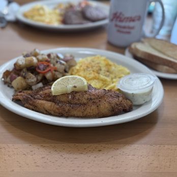 Himes Breakfast House - Southern fried catfish, scrambled eggs w /cheddar cheese, home fries, toast. - Breakfast & Brunch Near Me - Brandon, Florida Himes Breakfast House - Southern fried catfish, scrambled eggs w /cheddar cheese, home fries, toast. - Breakfast & Brunch Near Me - Brandon, Florida