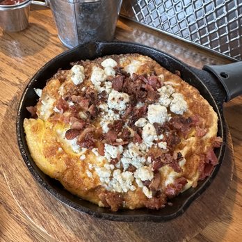 27 North - "The Sinner" skillet with corned beef hash, blue cheese, bacon, and over-hard eggs. Incredible! - Breakfast & Brunch Near Me - Conway, New Hampshire