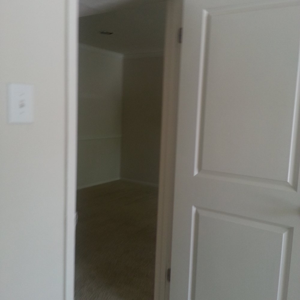 The Village Meadow - walkin closet with one bed - Apartments Near Me - Dallas, Texas The Village Meadow - walkin closet with one bed - Apartments Near Me - Dallas, Texas