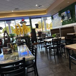 Cali Antojos Colombian Food - Table area