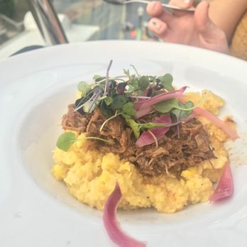 Metropolitan Kitchen & Lounge - Braised lamb over polenta with pickled onions - New American Near Me - Annapolis, Maryland Metropolitan Kitchen & Lounge - Braised lamb over polenta with pickled onions - New American Near Me - Annapolis, Maryland