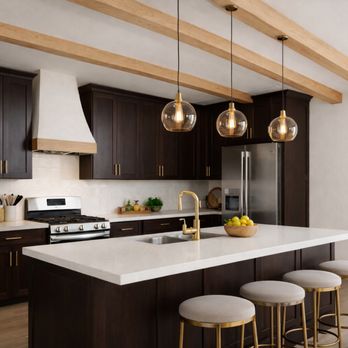 House of Eleton Design Studio - Kitchen with dark cabinetry, island seating, brass pendants, and exposed beams blending contrast, warmth, and function. - Interior Design Near Me - Temecula, California House of Eleton Design Studio - Kitchen with dark cabinetry, island seating, brass pendants, and exposed beams blending contrast, warmth, and function. - Interior Design Near Me - Temecula, California