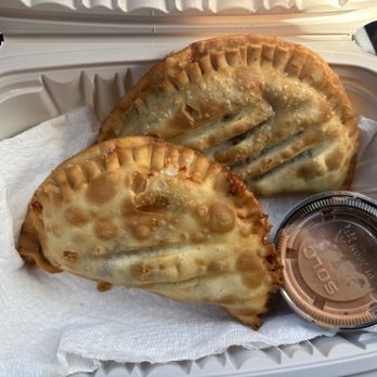 The Pull Up - In the back, the Chopped Cheese Empanada. In the front, the Chicken and Cheese Empanada, with Mayo ketchup. - Latin American Near Me - Tewksbury, Massachusetts