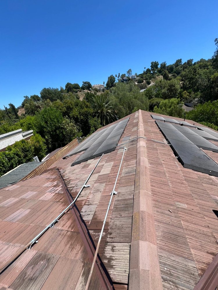 Slide of R Squared Roofing Services
