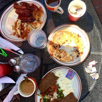 Our Kitchen - Breakfast table full of yum. - Breakfast & Brunch Near Me - Minneapolis, Minnesota