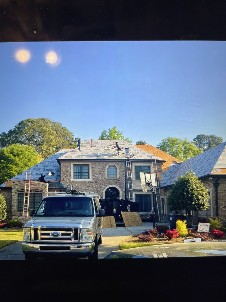 Slide of Hill Top Roofing