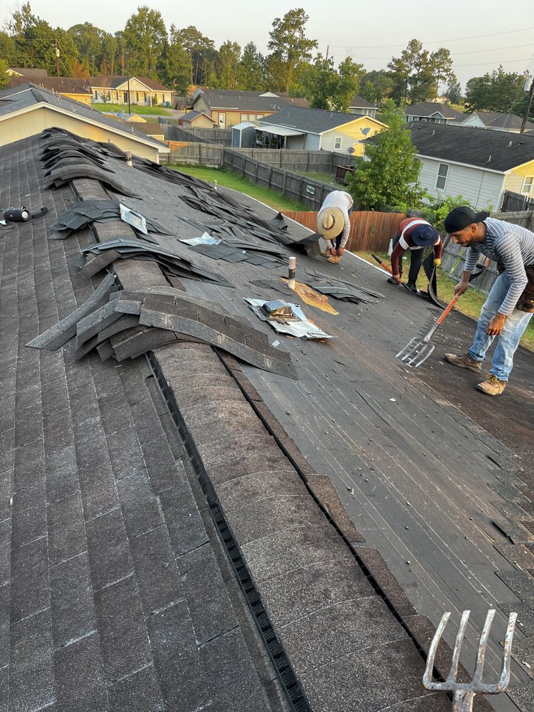 Slide of VG Roofing Service
