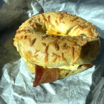 Biff's Bagels - Egg, bacon, and cheddar cheese on a green chili cheddar bagel - Bagels Near Me - Flagstaff, Arizona