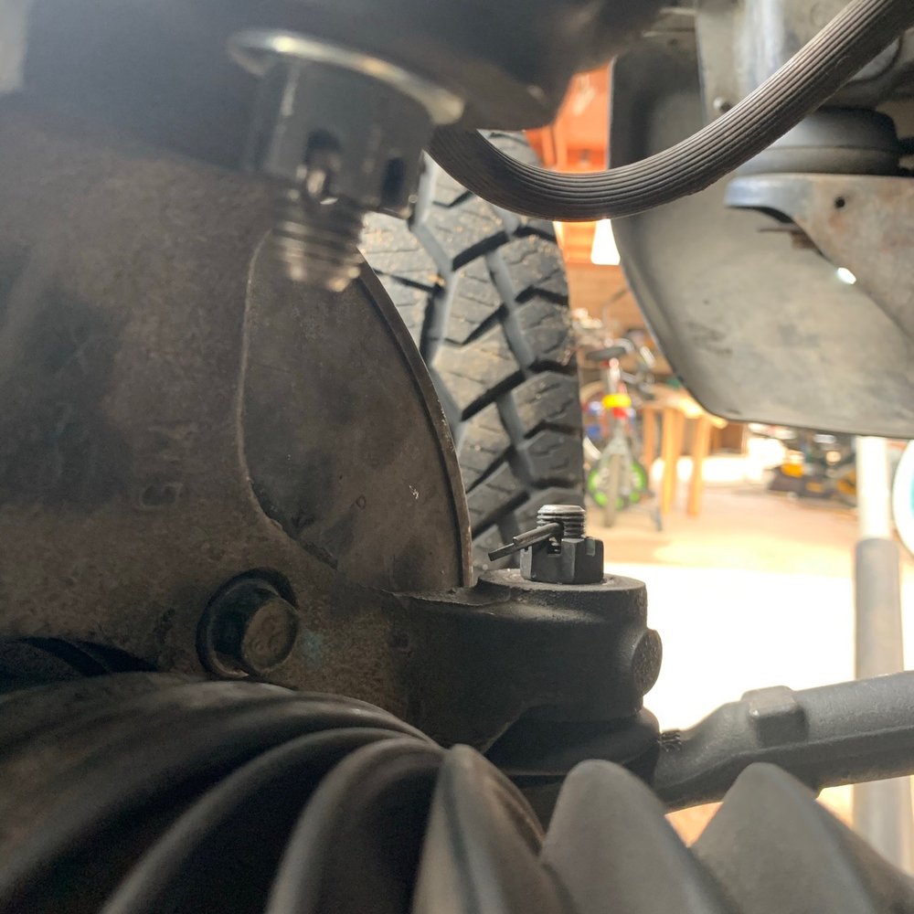 Xclusive Tire & Wheels - The upper joint doesn't even have the cotter pin it needs for safety to prevent the castle nut from fall off. - Car Stereo Installation Near Me - Tucson, Arizona Xclusive Tire & Wheels - The upper joint doesn't even have the cotter pin it needs for safety to prevent the castle nut from fall off. - Car Stereo Installation Near Me - Tucson, Arizona