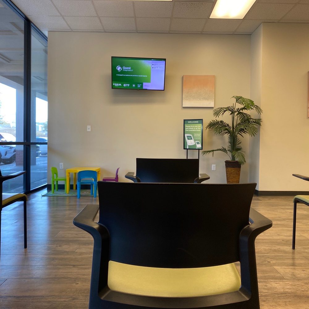 Waiting room with TV playing shows and intermittently displays your abbreviated name (for patient privacy) and approximate wait times. Waiting room with TV playing shows and intermittently displays your abbreviated name (for patient privacy) and approximate wait times.