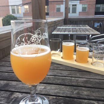 Triple Crossing Beer - Downtown - Pint of Knife and Nettle and a tasting flight on the patio. - Breweries Near Me - Richmond, Virginia Triple Crossing Beer - Downtown - Pint of Knife and Nettle and a tasting flight on the patio. - Breweries Near Me - Richmond, Virginia