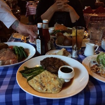 Ship Tavern - Ribeye steak dinner, prime rib dinner, wedge salad and in the back the Kobe Burger... very tasty I have to say, - American Near Me - Denver, Colorado Ship Tavern - Ribeye steak dinner, prime rib dinner, wedge salad and in the back the Kobe Burger... very tasty I have to say, - American Near Me - Denver, Colorado