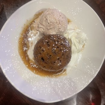 The Blue Ox - Sticky Toffee Pudding Whiskey caramel toffee sauce, whipped cream 12 with cinnamon ice cream - New American Near Me - Lynn, Massachusetts The Blue Ox - Sticky Toffee Pudding Whiskey caramel toffee sauce, whipped cream 12 with cinnamon ice cream - New American Near Me - Lynn, Massachusetts