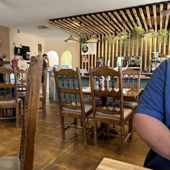 Amigo Cafe - a man sitting at a table - Mexican Near Me - Kayenta, Arizona