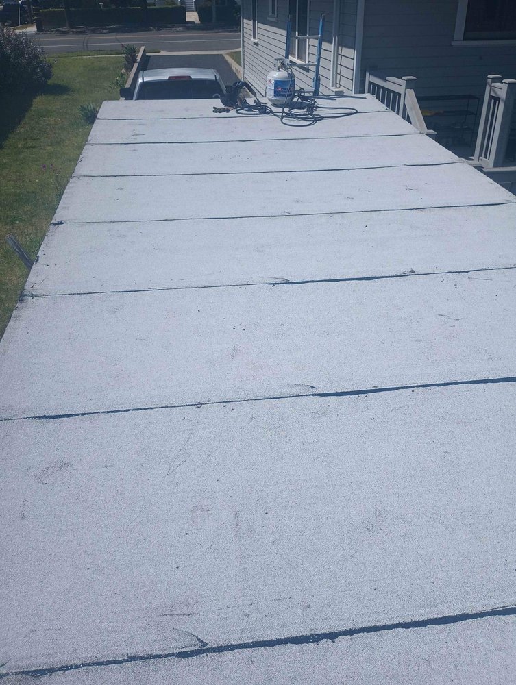 Slide of Molina’s Roofing