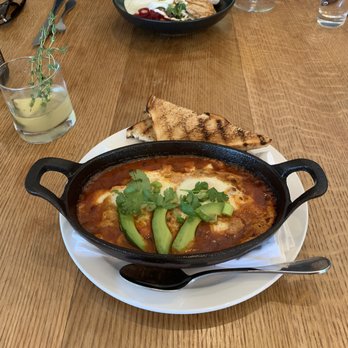 Mour Cocina | Bodega - Shakshuka (Eggs in cheesy purgatory) - Wine Bars Near Me - Austin, Texas