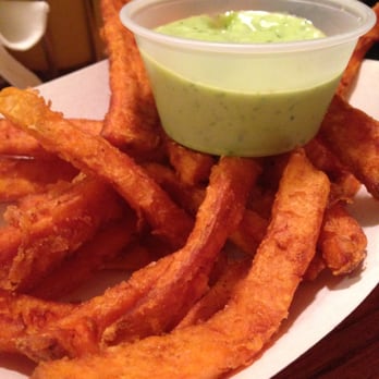 Harry's on Main - Sweet potato fries with the mysterious, delicious green sauce. - Bars Near Me - Providence, Rhode Island Harry's on Main - Sweet potato fries with the mysterious, delicious green sauce. - Bars Near Me - Providence, Rhode Island