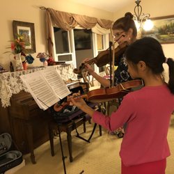 Cozean Music Violin Studio - Playing a duet with my student