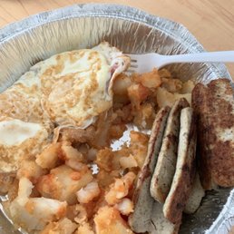 Two eggs over easy "home fries" and turkey sausage Two eggs over easy "home fries" and turkey sausage