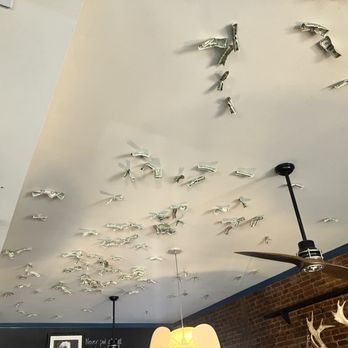 Rumor Has It - Where for some odd reason I used a thumbtack and a quarter to tack a $1 bill to the ceiling. - Steakhouses Near Me - Hannibal, Missouri