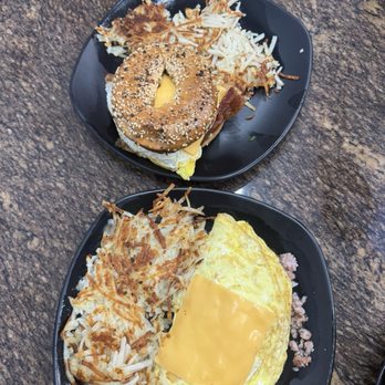 Pesto Cafe and grill - Omelette Meat Style with hashbrowns with Bagel egg and cheese sandwich - Sandwiches Near Me - Miami, Florida Pesto Cafe and grill - Omelette Meat Style with hashbrowns with Bagel egg and cheese sandwich - Sandwiches Near Me - Miami, Florida