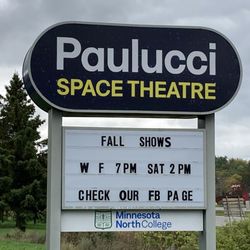 Paulucci Space Theater - Sign located along US Highway 169