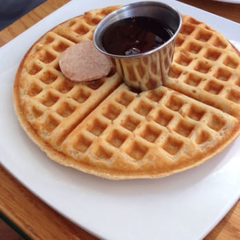 Graze - Waffle with cinnamon butter and real maple syrup. Crispy on the outside and relatively fluffy on the inside. - New American Near Me - Madison, Wisconsin