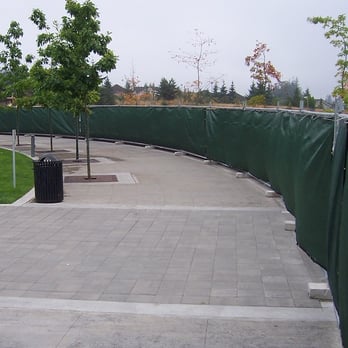 On Site Security Services - Temporary chain link fence with privacy screen - Security Services Near Me