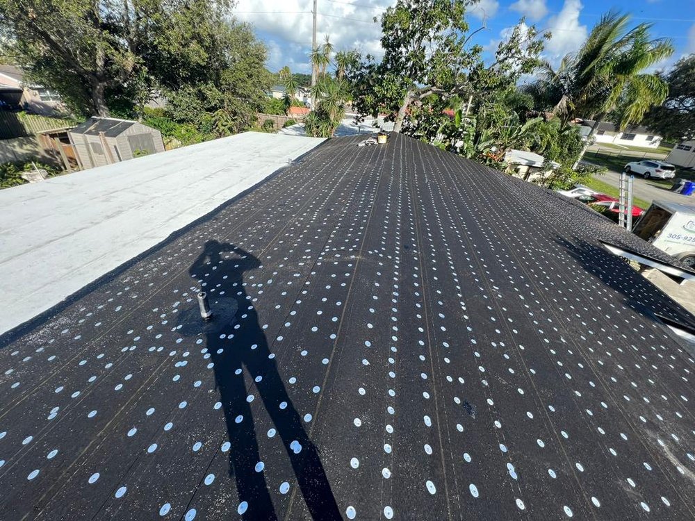 Slide of Kingsman Roofing