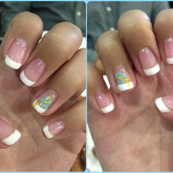 Fellini Nail Studio - Left & Right hand w/ French tip gel nails & a flower design - Nail Salons Near Me - Santa Clara, California Fellini Nail Studio - Left & Right hand w/ French tip gel nails & a flower design - Nail Salons Near Me - Santa Clara, California