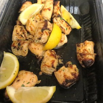 Luna Grill Ventura - Chicken kabobs (half gone!) with lemons - moist and very flavorful. This is the catering small size that serves five. - Mediterranean Near Me - Ventura, California Luna Grill Ventura - Chicken kabobs (half gone!) with lemons - moist and very flavorful. This is the catering small size that serves five. - Mediterranean Near Me - Ventura, California