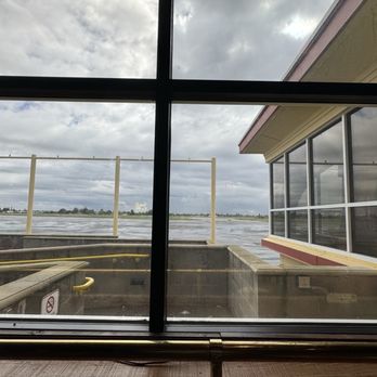 Aviator's - View of the runway and taxiway, but cold and rainy below minimums. - Breakfast & Brunch Near Me - Sacramento, California Aviator's - View of the runway and taxiway, but cold and rainy below minimums. - Breakfast & Brunch Near Me - Sacramento, California