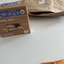 The shipping bag my items arrived inside of & the protein bars I ordered. One of which is in a box, as expected.