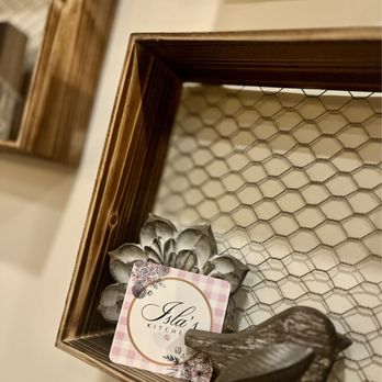 Isla's Kitchen - a wooden frame with a note and a pair of shoes - Southern Near Me - Tulsa, Oklahoma Isla's Kitchen - a wooden frame with a note and a pair of shoes - Southern Near Me - Tulsa, Oklahoma