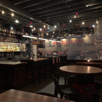 El Camino's - an empty bar with tables and chairs - Latin American Near Me - Vancouver, British Columbia El Camino's - an empty bar with tables and chairs - Latin American Near Me - Vancouver, British Columbia