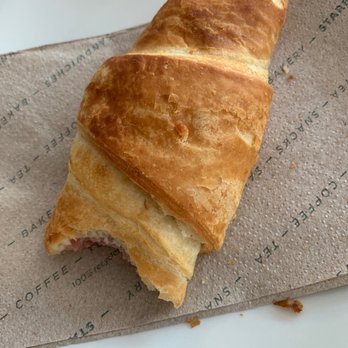 Starbucks - Ham and Swiss Cheese Croissant (with one bite taken!) - Coffee & Tea Near Me - Boca Raton, Florida